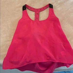 Bright pink tank-top.